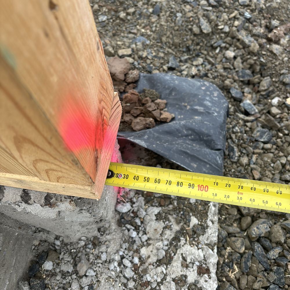 Timber bottom plate overhanging the slab, recorded on a frame inspection in Fraser Rise