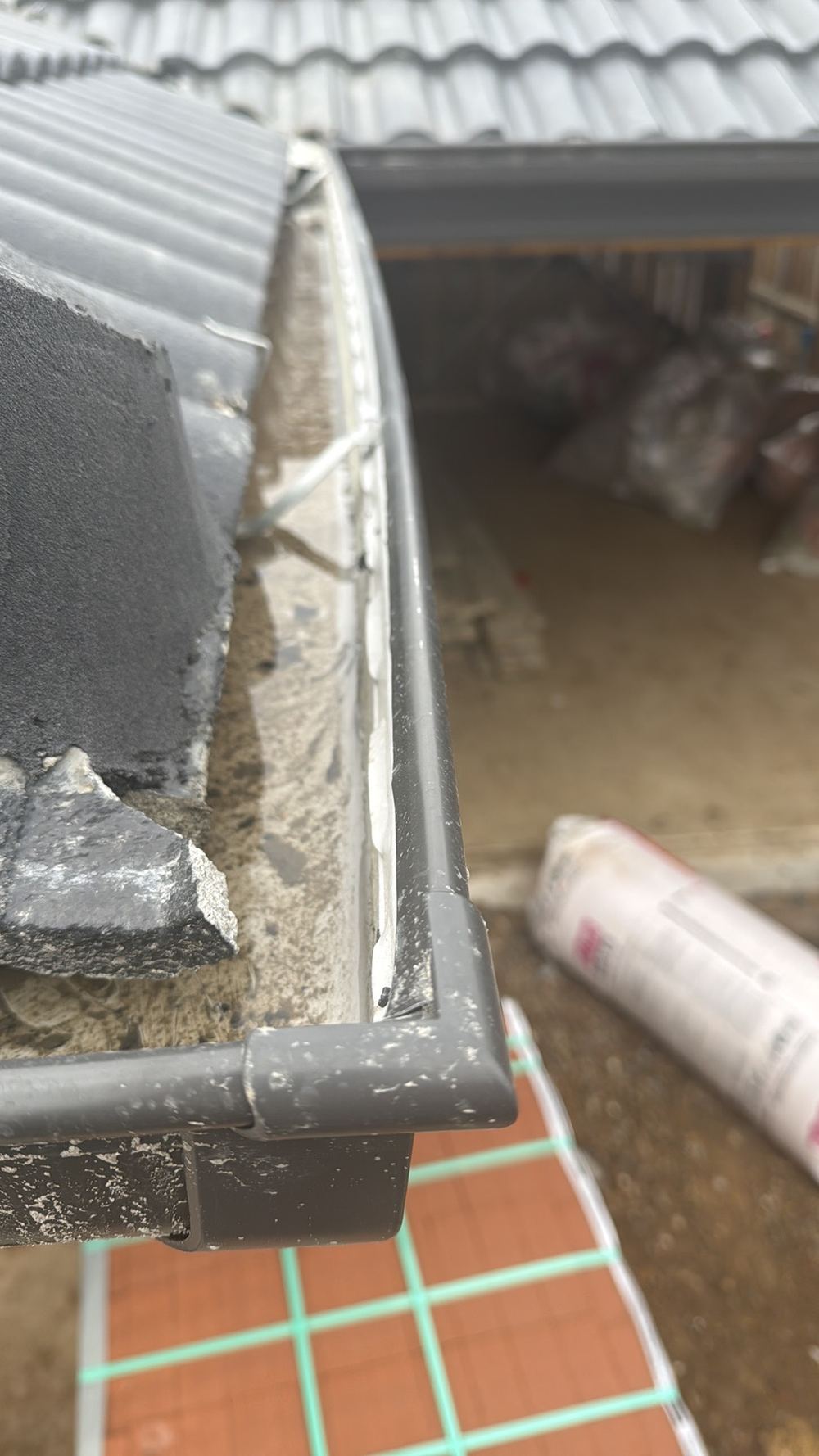 Gutter holding water because its fall is wrong, Fraser Rise