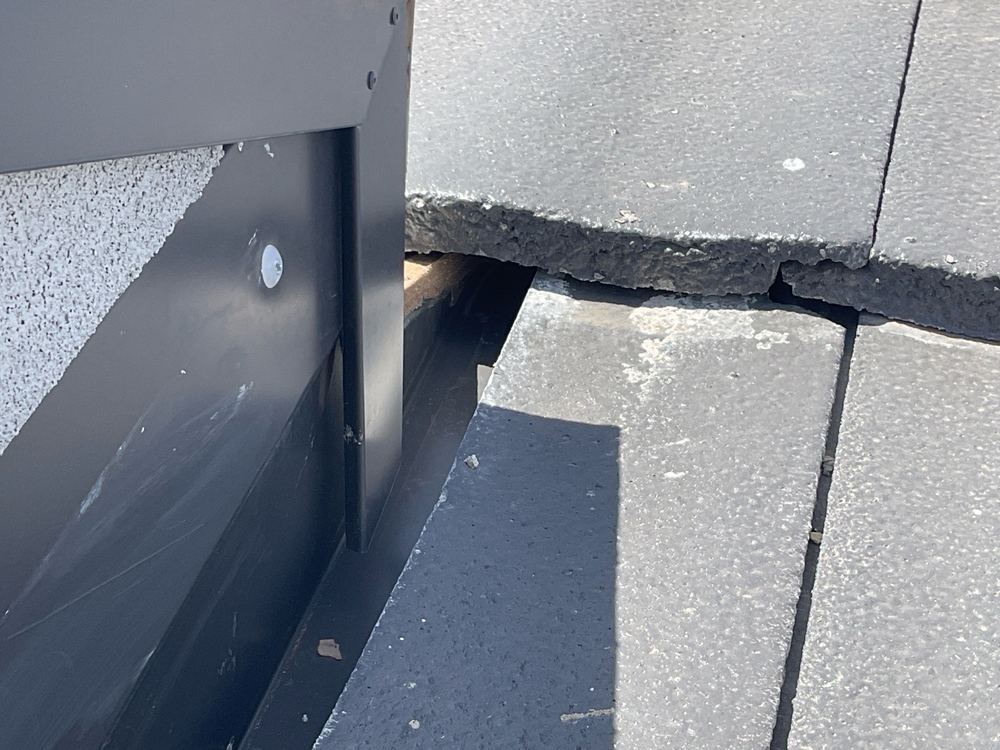 Cracked roof tile, recorded on a pre-handover inspection in Fraser Rise