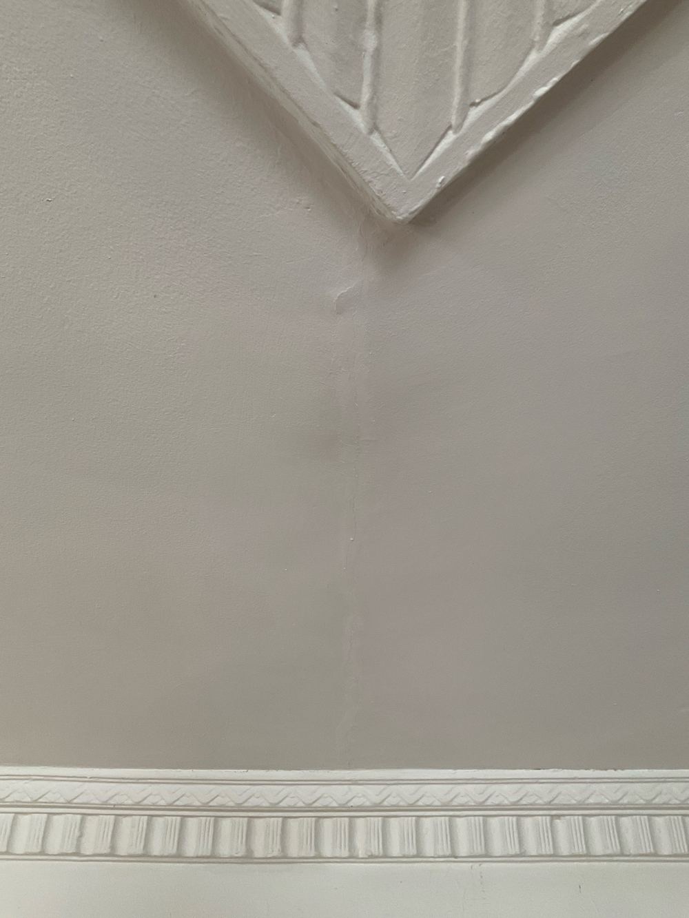 Settlement cracking to walls and cornices, found during a pre-purchase inspection in Newport